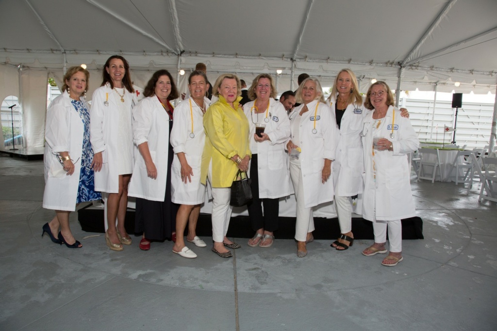 group of women in doctor's white coats